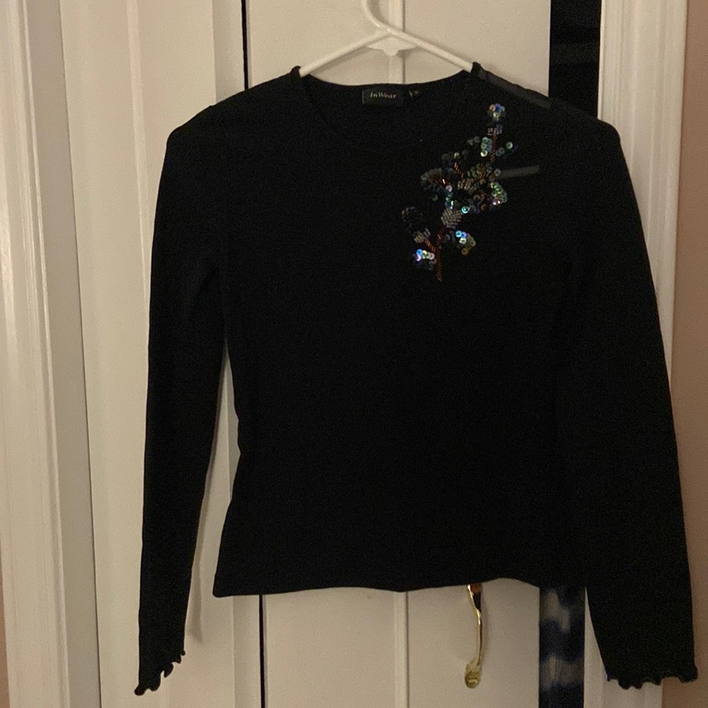 Black top with sequence design
